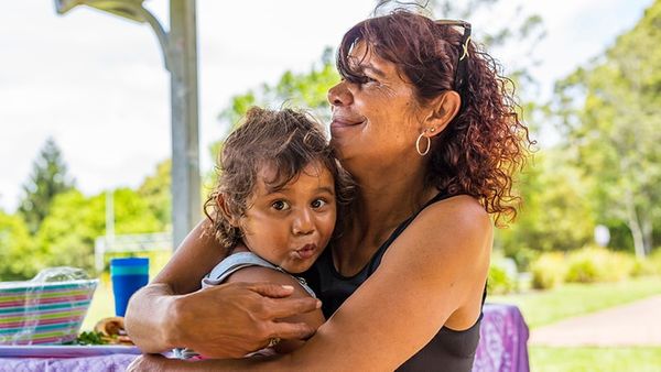 Aboriginal woman hugging grandchild (1).jpg